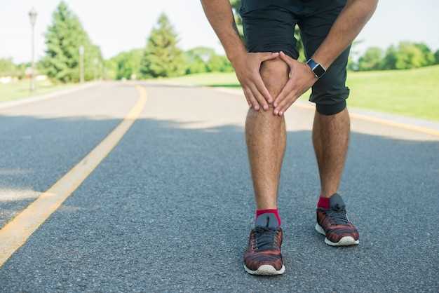 Почему возникает боль в коленях после приседаний?